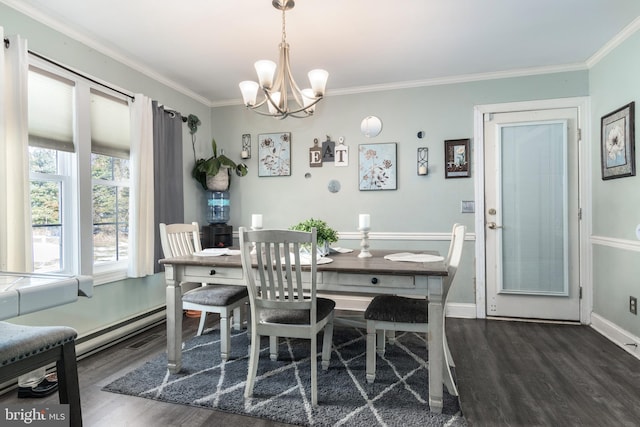 dining room featuring a baseboard heating unit, dark hardwood / wood-style floors, ornamental molding, and an inviting chandelier