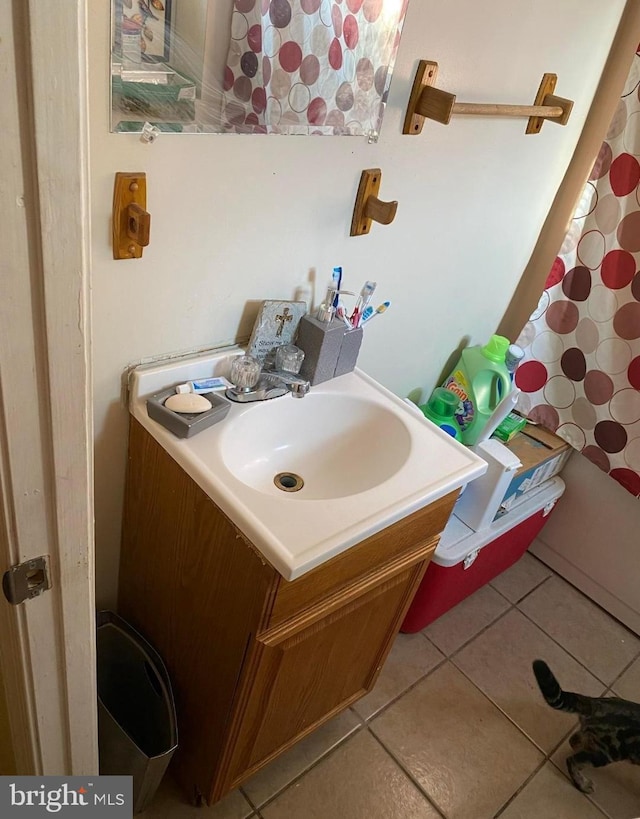 bathroom featuring tile patterned floors and vanity