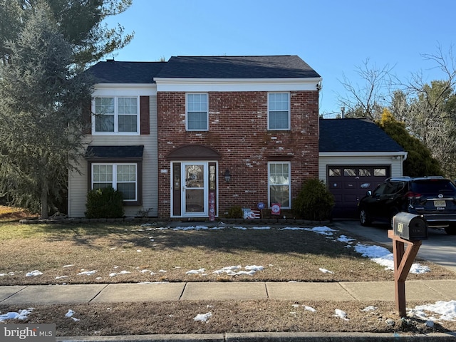 view of front of property featuring a garage