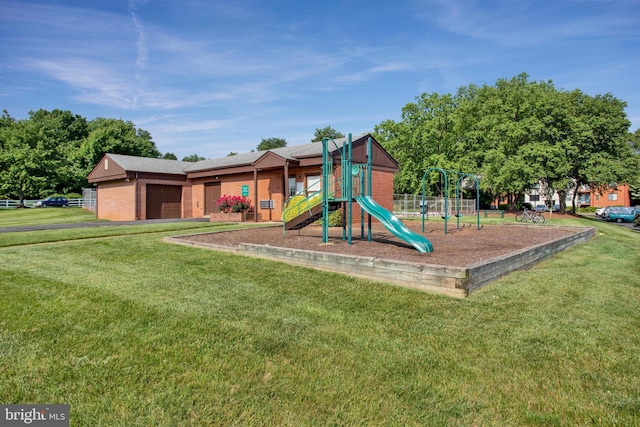 view of jungle gym with a lawn