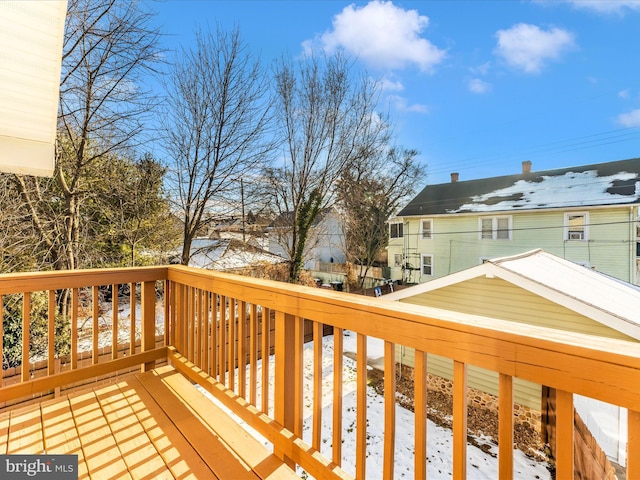 view of snow covered deck