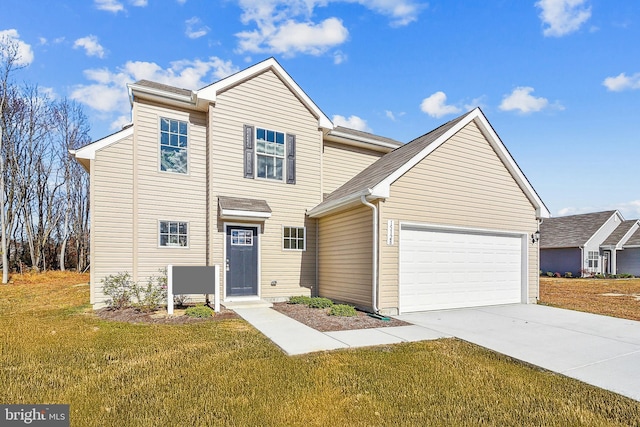 view of front of property featuring a garage and a front yard