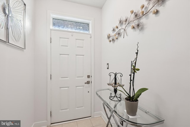 foyer with light tile patterned flooring