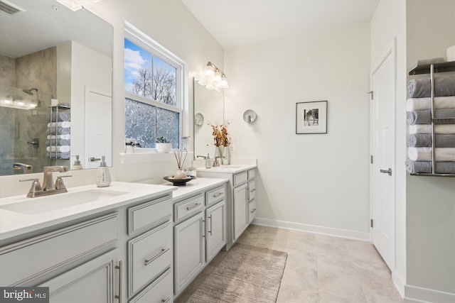 bathroom with vanity and an enclosed shower