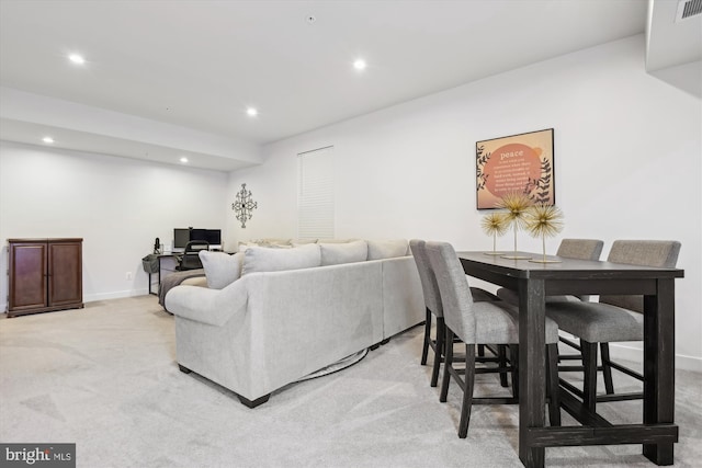 living room featuring light colored carpet