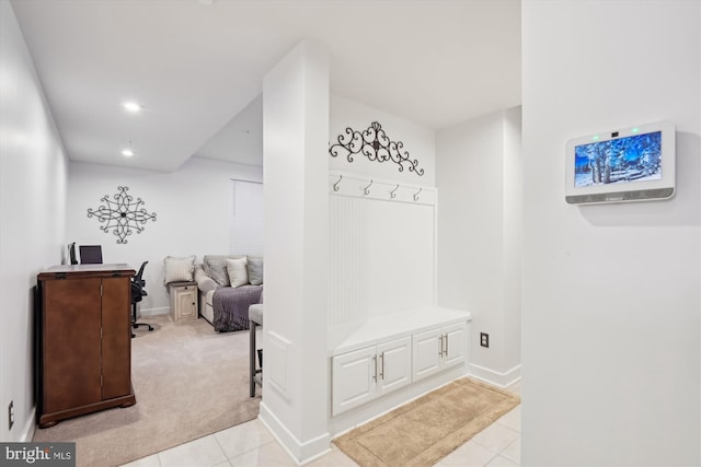 mudroom featuring light tile patterned flooring