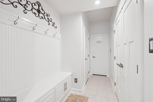 mudroom featuring light tile patterned flooring