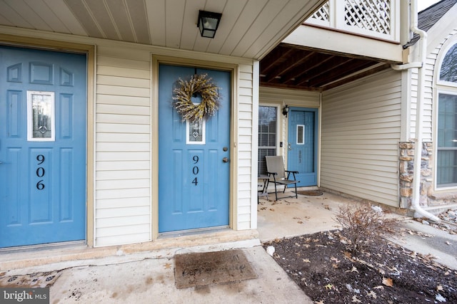 property entrance with a balcony