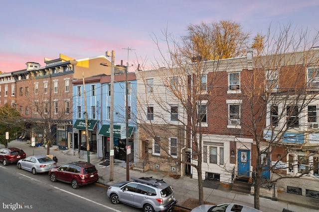 view of property at dusk