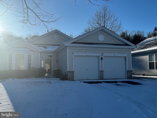 view of front of home featuring a garage