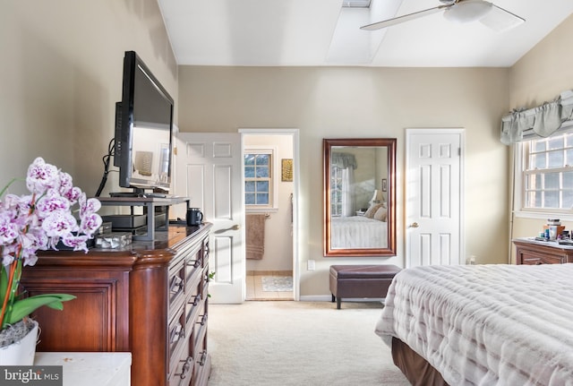 bedroom featuring light carpet and ceiling fan