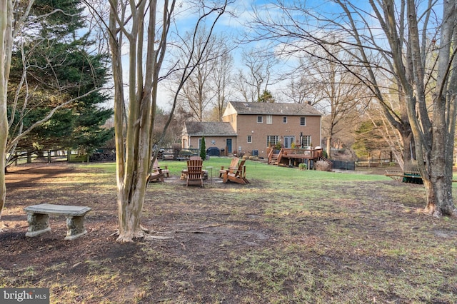 view of yard with a deck