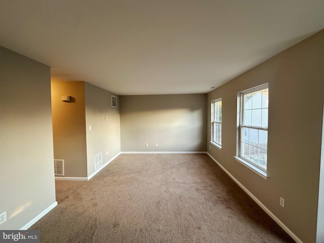 view of carpeted spare room