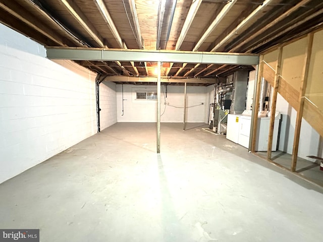 basement featuring washer and clothes dryer