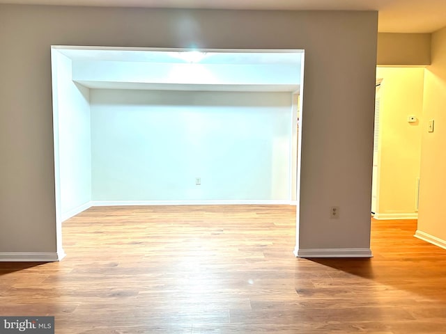 spare room featuring light hardwood / wood-style flooring