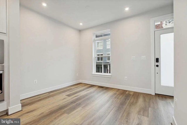 interior space with light hardwood / wood-style flooring