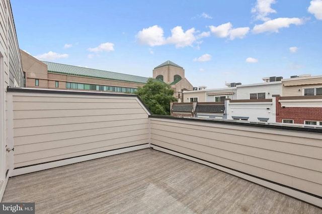 view of patio featuring a balcony