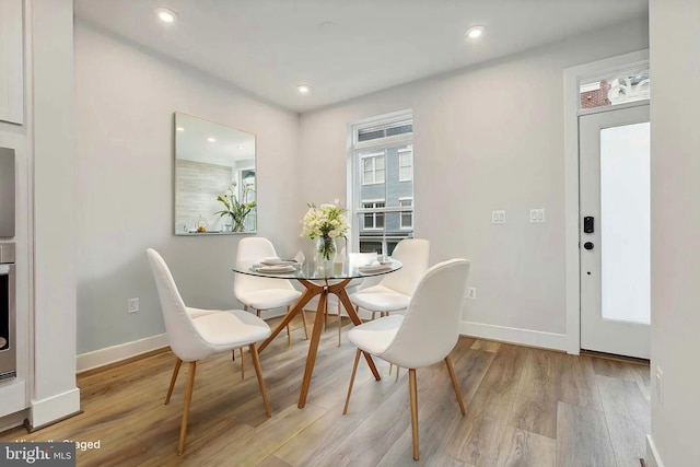 dining room featuring light hardwood / wood-style flooring