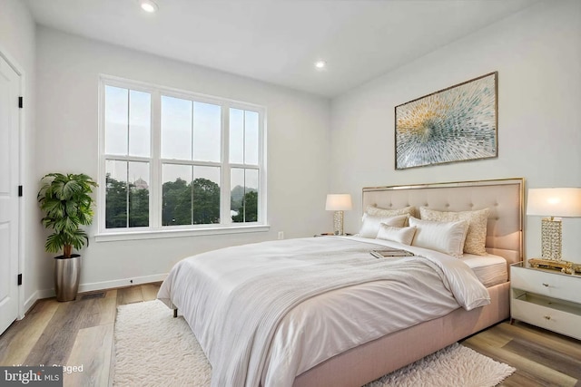 bedroom featuring light hardwood / wood-style flooring