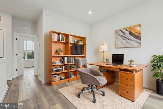 office area featuring hardwood / wood-style floors