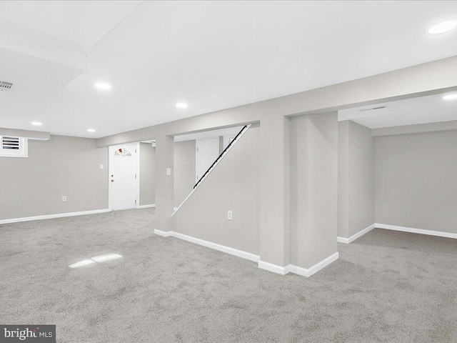 basement with carpet flooring