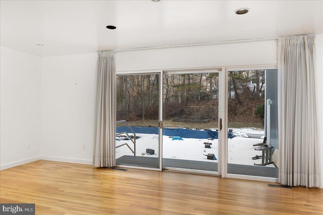 interior space with hardwood / wood-style flooring