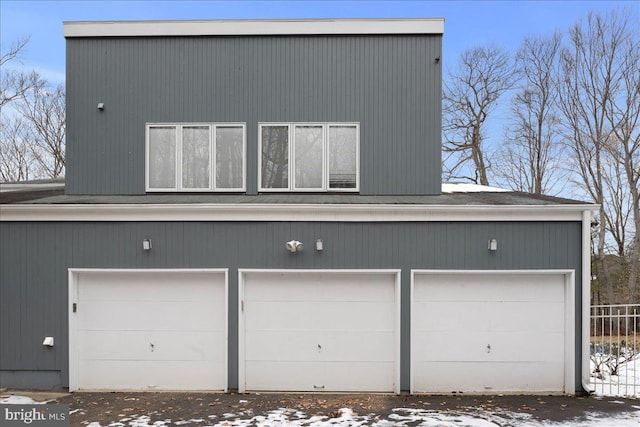 view of snow covered garage