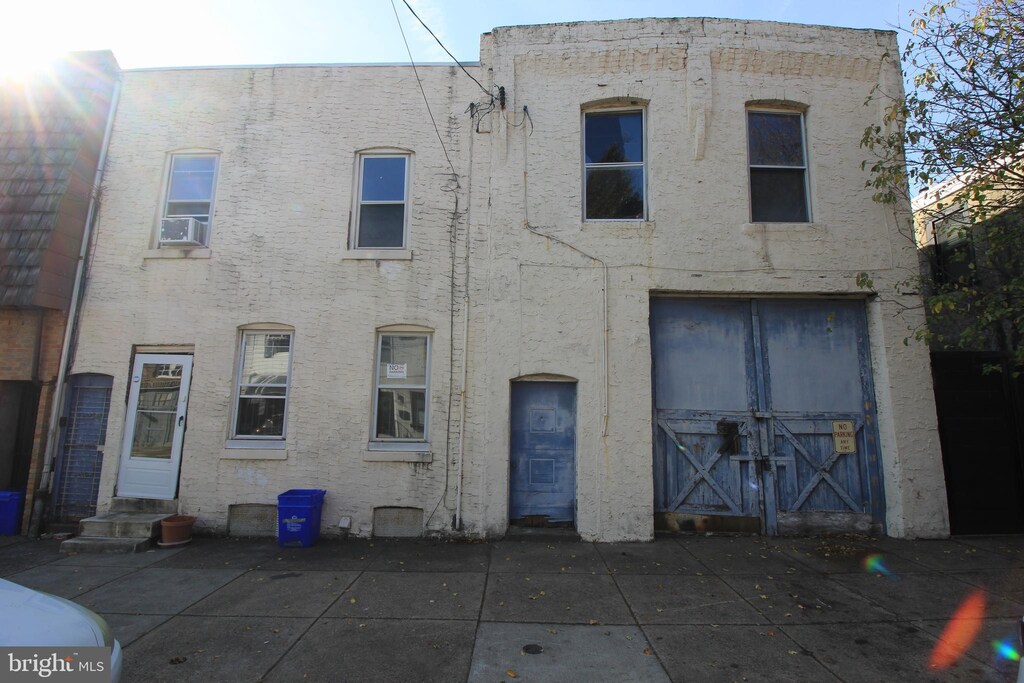 2706 E Monmouth St, Philadelphia, PA 19134 - view of front of home featuring cooling unit and a patio area