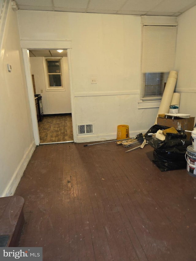 empty room featuring dark hardwood / wood-style flooring