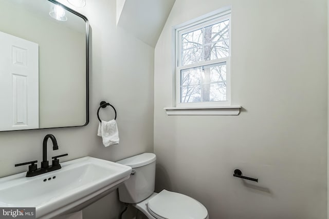 bathroom with toilet and sink