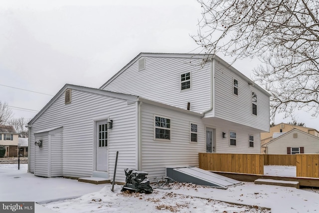 view of snow covered house