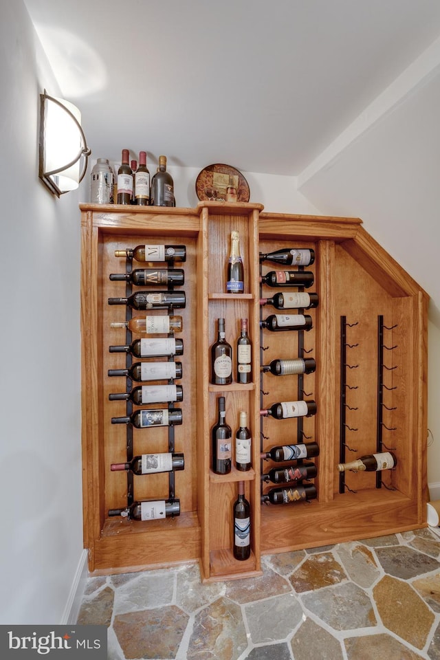 wine room featuring stone tile flooring