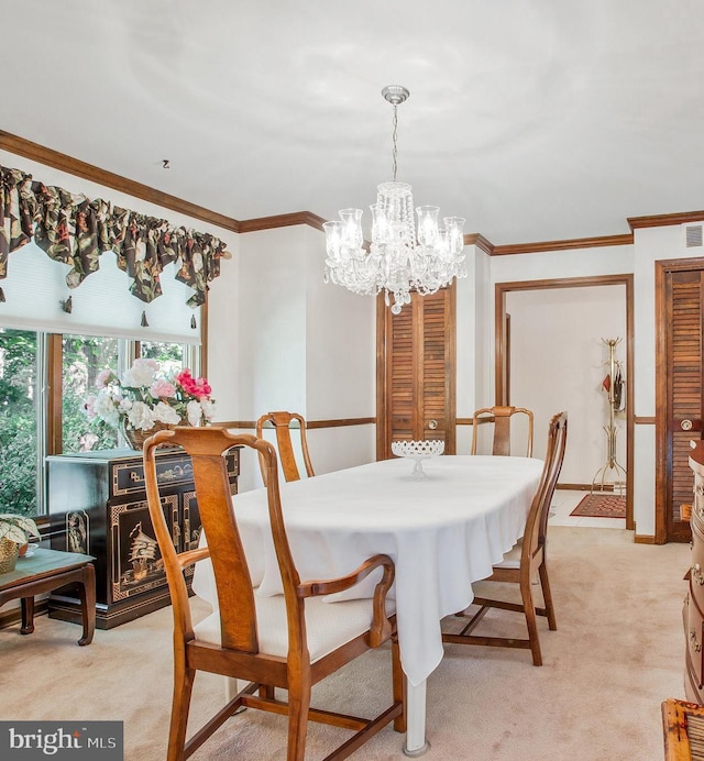 dining space featuring crown molding, light colored carpet, and an inviting chandelier