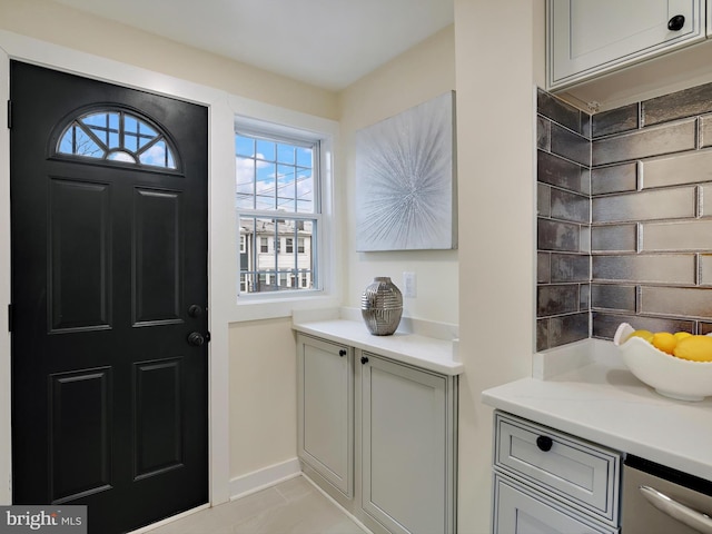 entrance foyer featuring light tile patterned floors