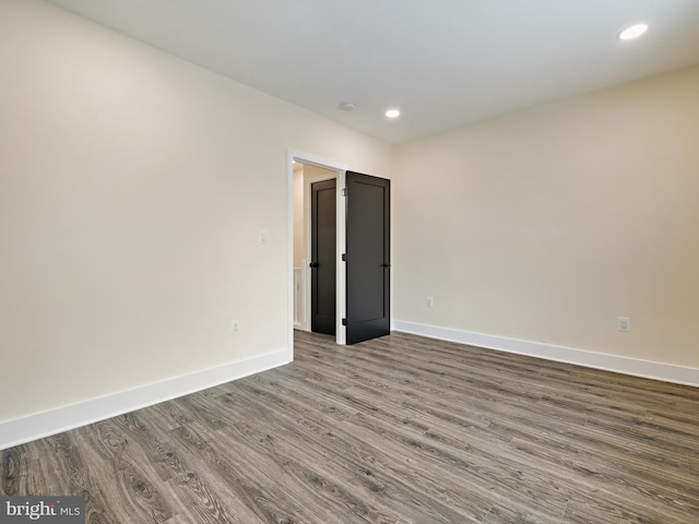 empty room featuring hardwood / wood-style floors