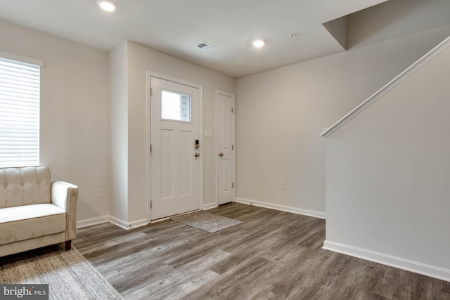 foyer entrance featuring wood-type flooring