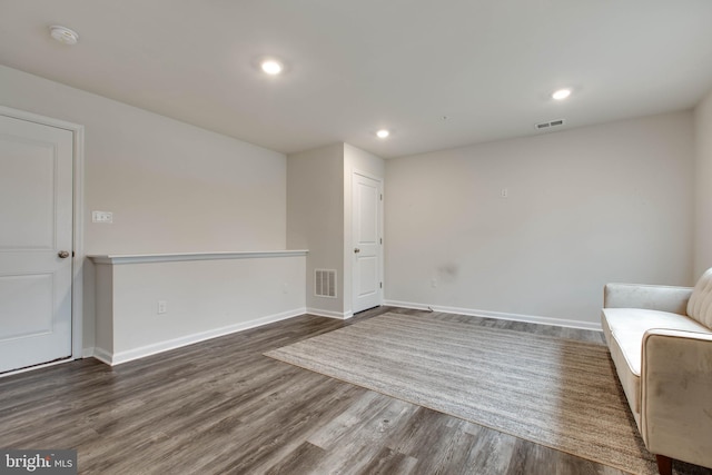 unfurnished room featuring dark hardwood / wood-style floors