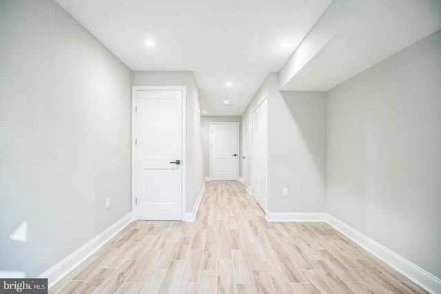 hallway featuring light hardwood / wood-style floors