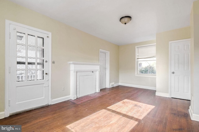 foyer entrance featuring dark hardwood / wood-style flooring