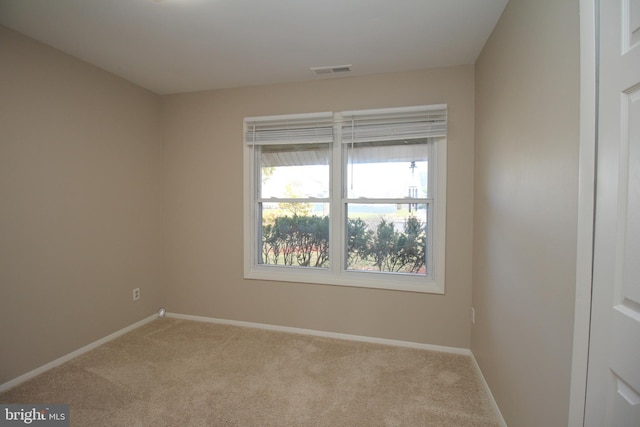 view of carpeted spare room