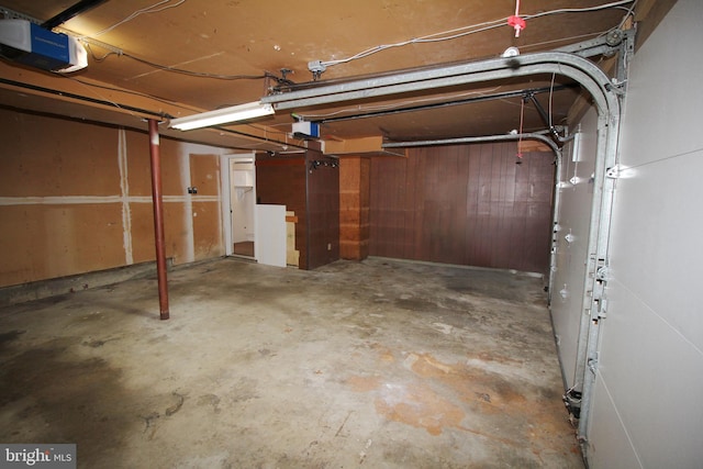 basement with wooden walls