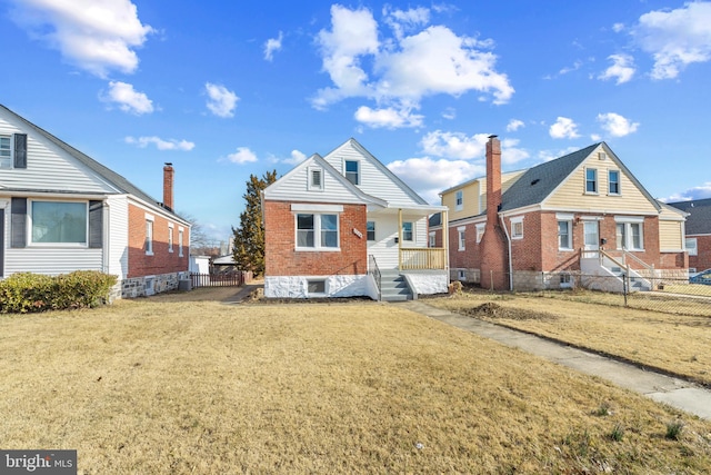 view of front of house with a front lawn