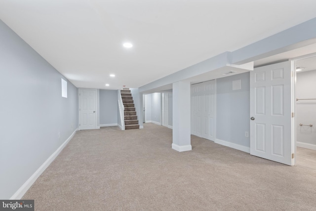 basement with light carpet