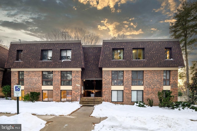 view of snow covered property