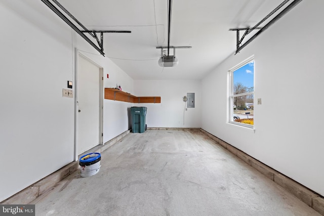 garage with electric panel and a garage door opener