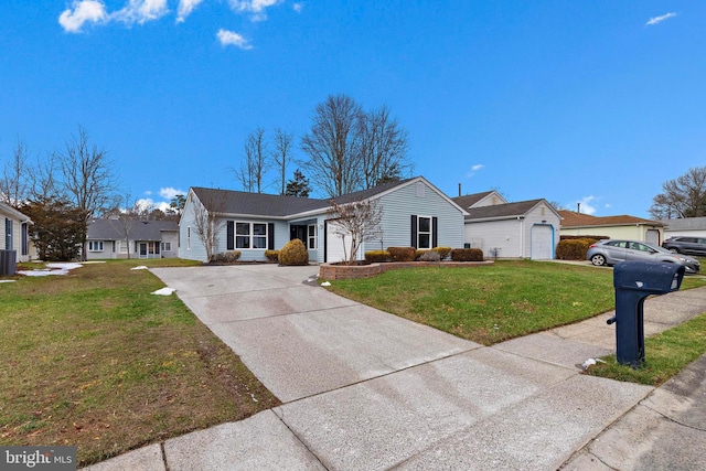 ranch-style home featuring a garage and a front lawn