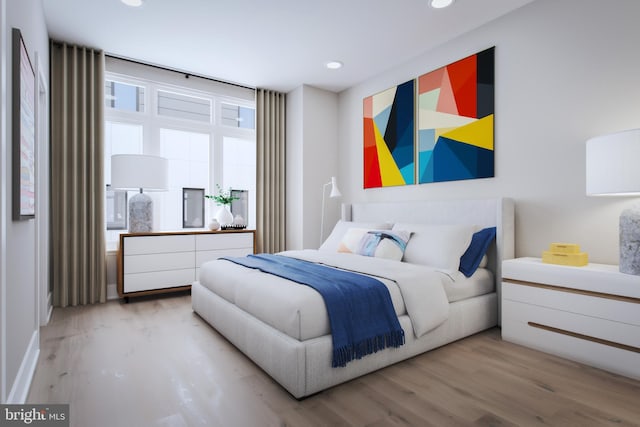 bedroom featuring light wood-type flooring