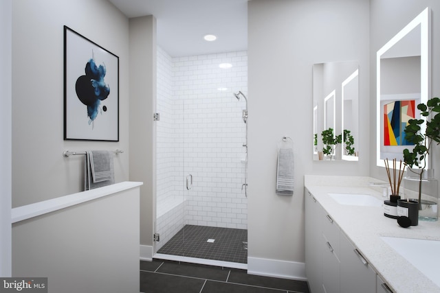 bathroom with vanity, tile patterned floors, and walk in shower