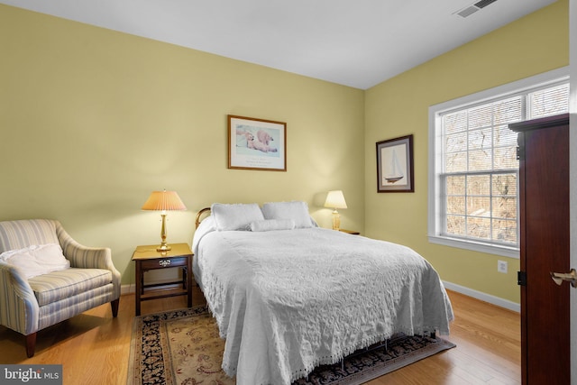 bedroom with light wood-type flooring