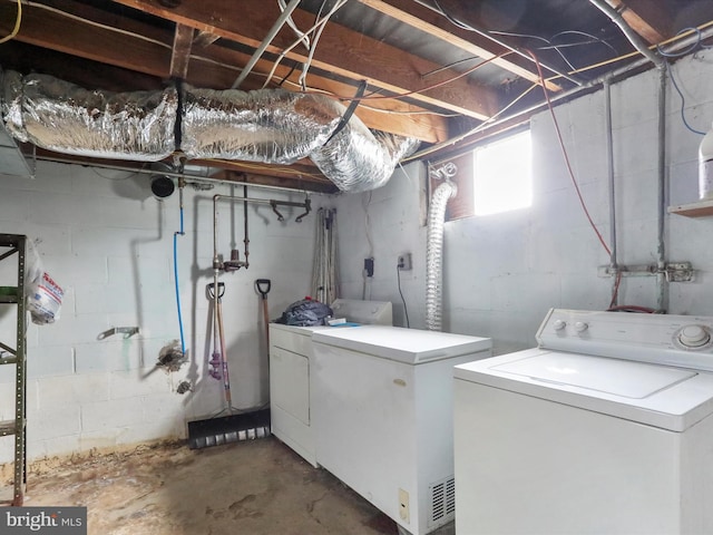 laundry area featuring washing machine and dryer